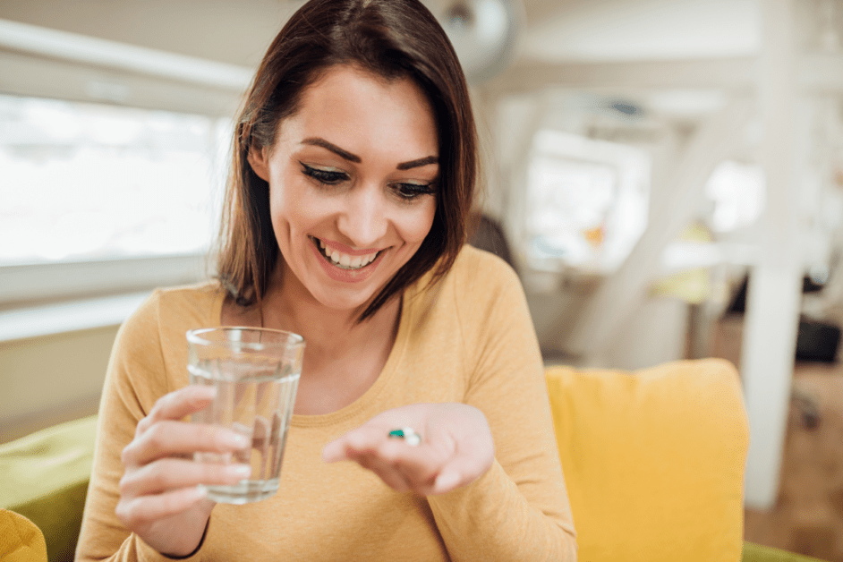 Woman taking Supplements After Age 50