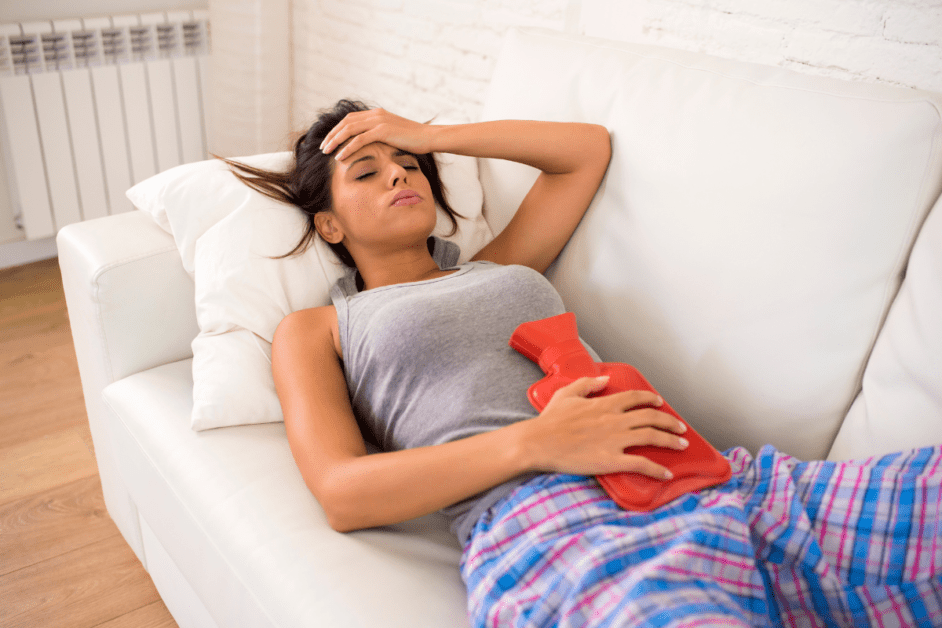 a woman having menstrual cramps